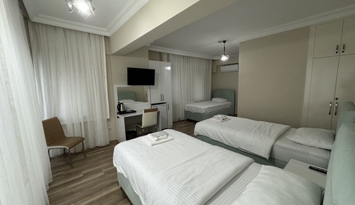 Habitación triple estándar, baño privado, vistas al mar