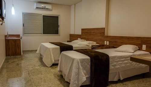 Habitación triple de lujo, varias camas