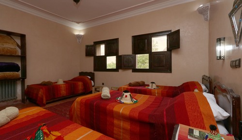 Habitación cuádruple, varias camas