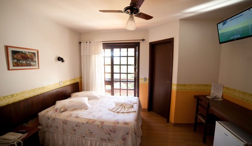 Habitación triple Deluxe, varias camas