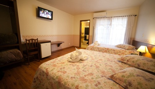 Habitación triple Deluxe, varias camas