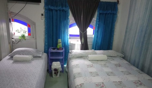 Habitación familiar, varias camas