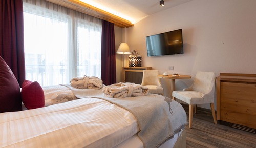 Habitación superior con 1 cama doble o 2 individuales