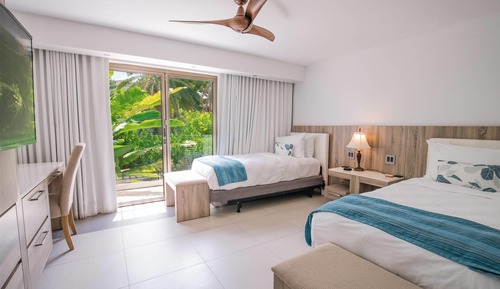 Suite, varias camas, cocina, frente al mar