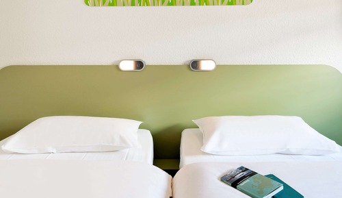 Habitación triple, varias camas