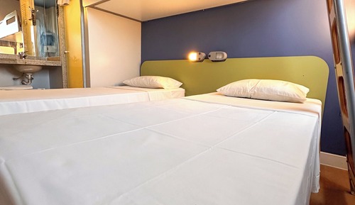 Apartamento com 3 Camas de Solteiro.