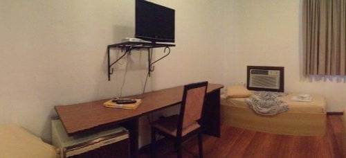 Habitación cuádruple (Solteiro)