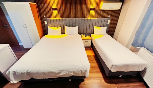 Habitación triple Deluxe