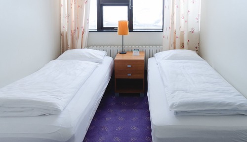 Habitación económica con 1 cama doble o 2 individuales, baño compartido