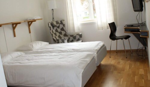 Habitación con 1 cama doble o 2 individuales