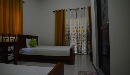 Habitación Deluxe con 2 camas individuales, vistas al jardín
