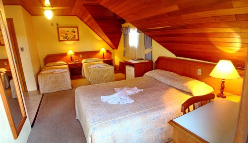 Habitación triple Deluxe, varias camas