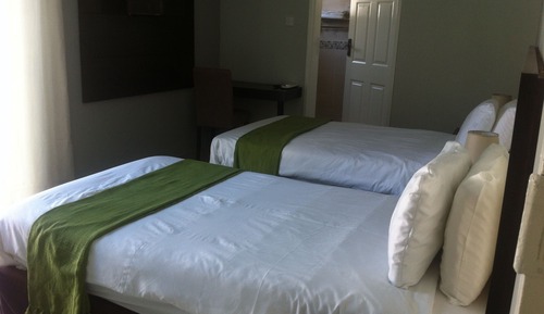 Habitación estándar con 2 camas individuales, vistas al jardín