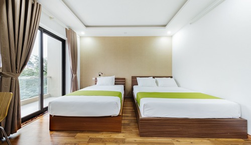 Suite Twin Room with Balcony Garden View