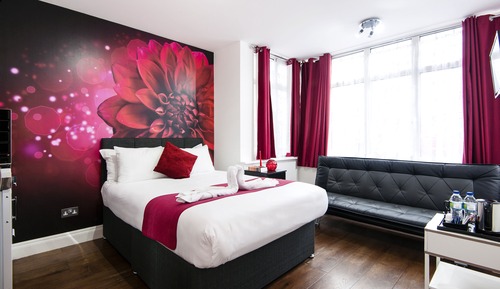 Habitación triple Deluxe, varias camas