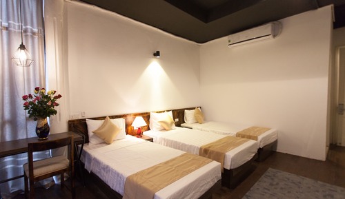 Habitación triple de lujo