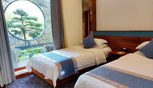 Habitación básica con 2 camas individuales