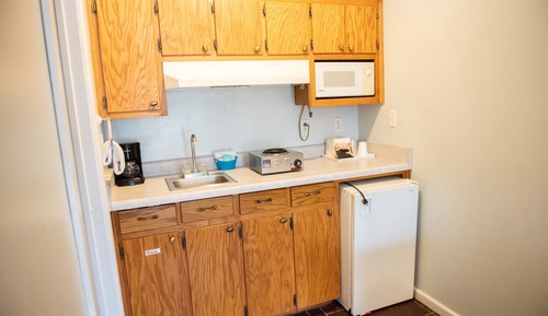 Habitación tradicional, 1 cama de matrimonio grande, cocina básica