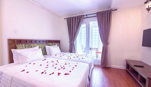 Habitación cuádruple Deluxe