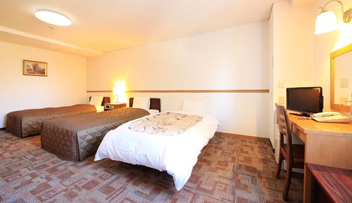 Habitación triple, fumadores