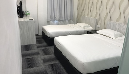 Habitación triple Deluxe