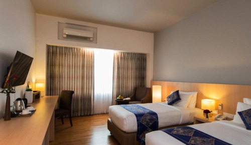Habitación Deluxe con 1 cama doble o 2 individuales
