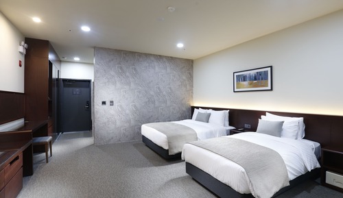 Habitación familiar con 2 camas individuales