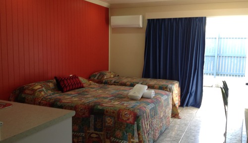 Habitación triple, varias camas