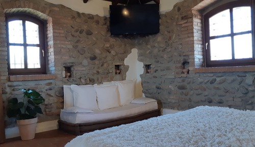 Suite romántica, varias camas, vistas al jardín, en una planta alta