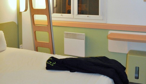 Habitación triple, varias camas
