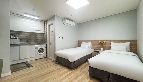 Habitación ejecutiva con 2 camas individuales, vistas a la ciudad
