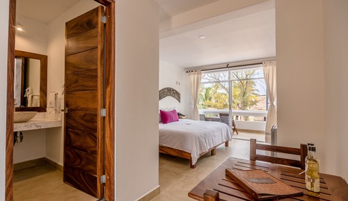 Habitación Deluxe, 1 cama de matrimonio grande, vistas parciales al mar