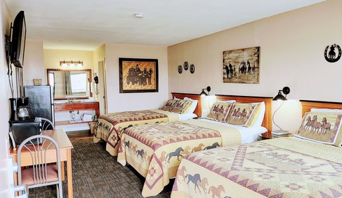 Habitación triple Premium, varias camas