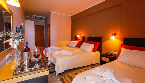 Habitación triple, vistas al mar