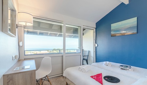 Habitación con 2 camas individuales, vistas al mar