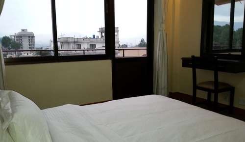 Habitación Deluxe doble, 1 habitación, fumadores, vistas a la ciudad