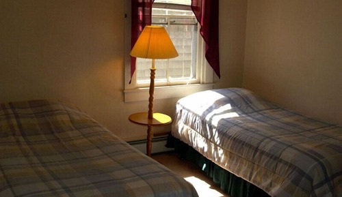 Habitación, varias camas