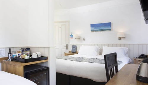 Habitación triple familiar, varias camas