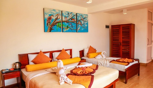 Habitación triple Deluxe
