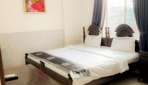 Habitación con 2 camas individuales