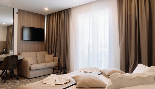 Habitación Deluxe con 2 camas individuales, vistas parciales al mar