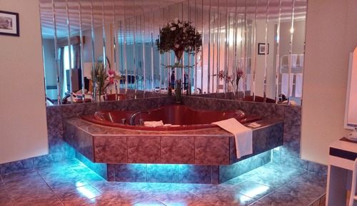 Suite Deluxe, varias camas, bañera de hidromasaje (Fireplace)