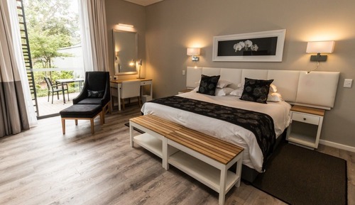Habitación de lujo con 1 cama doble o 2 individuales, baño privado, vistas al jardín