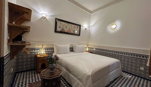 Habitación estándar con 1 cama doble o 2 individuales