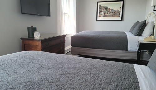 Habitación, varias camas