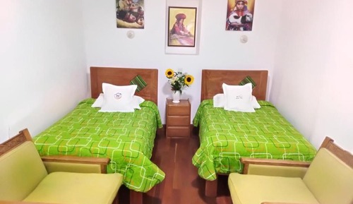Habitación con 2 camas individuales