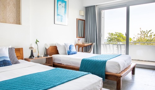 Habitación Deluxe con 2 camas individuales, 2 camas individuales, balcón, vistas al mar