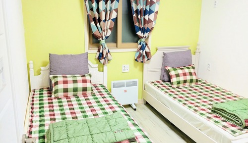 Habitación con 2 camas individuales