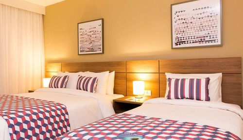 Habitación superior, varias camas