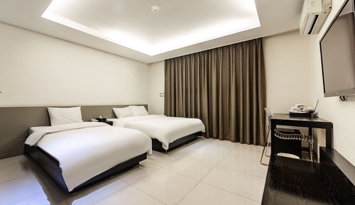 Habitación estándar con 1 cama doble o 2 individuales